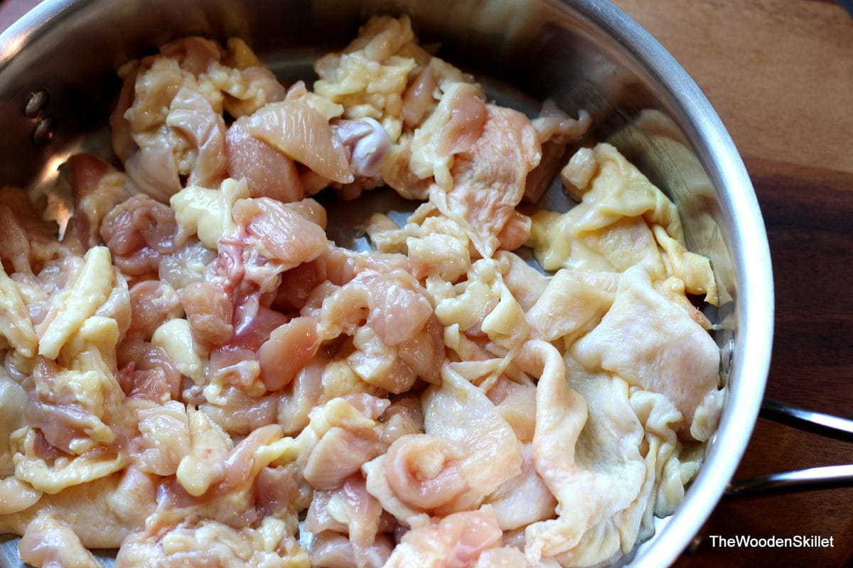 Chicken fat in a large pan. 