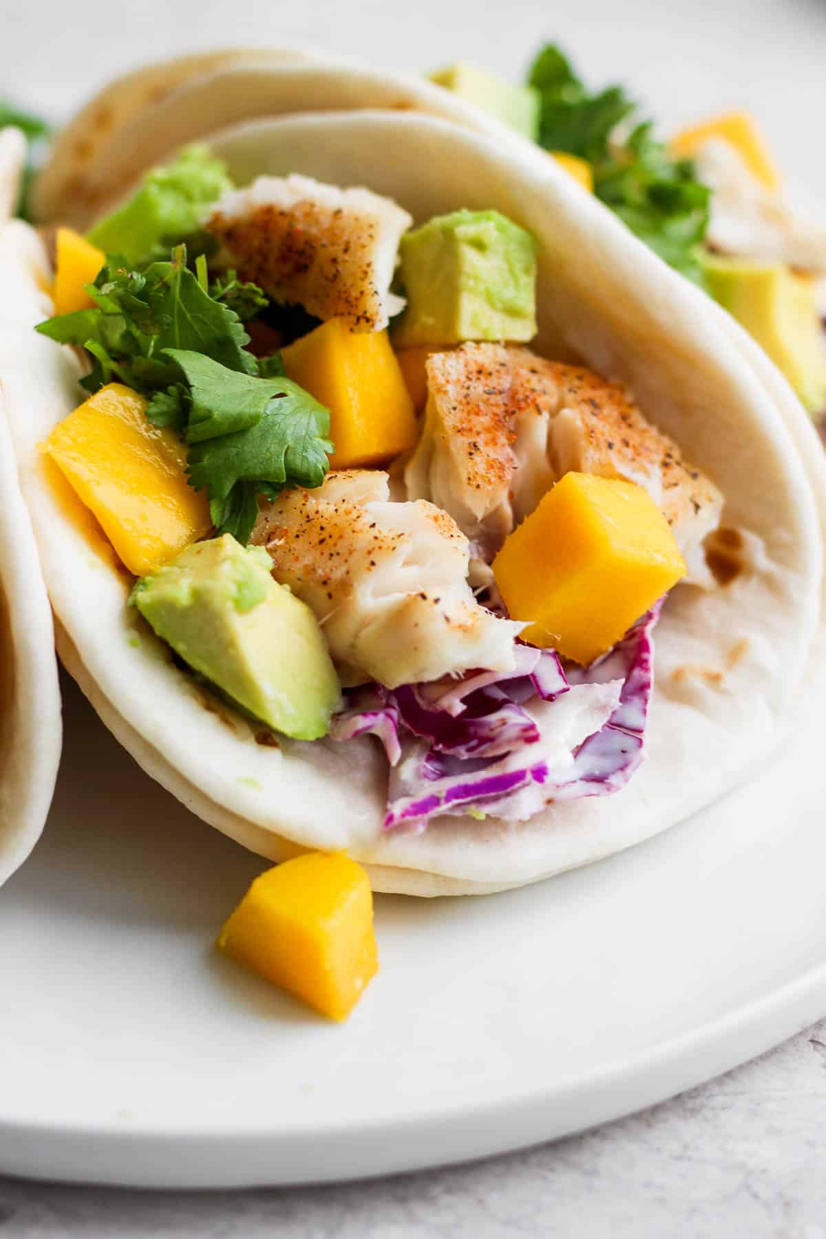 Baked tilapia in a fish taco.