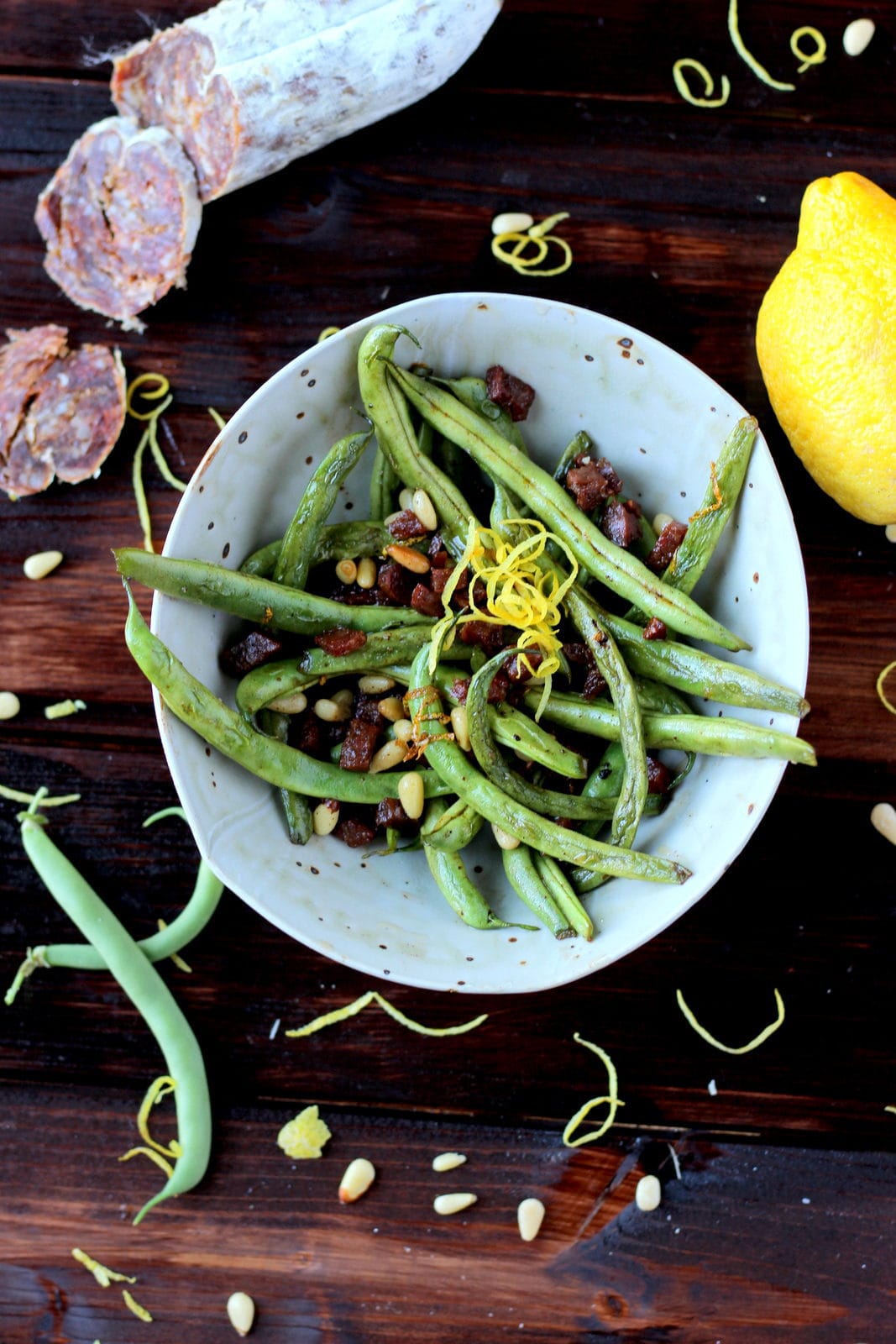 Green Beans with Spanish Chorizo, Pine Nuts and Lemon Zest - thewoodenskillet.com #sidedish