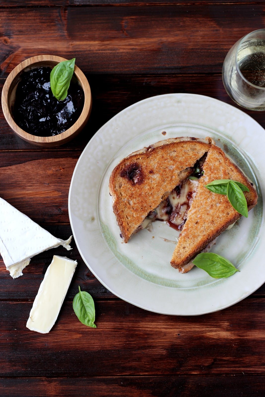 Baked Brie Grilled Cheese Sandwich with Sweet Basil - thewoodenskillet.com #grilledcheese #meatless