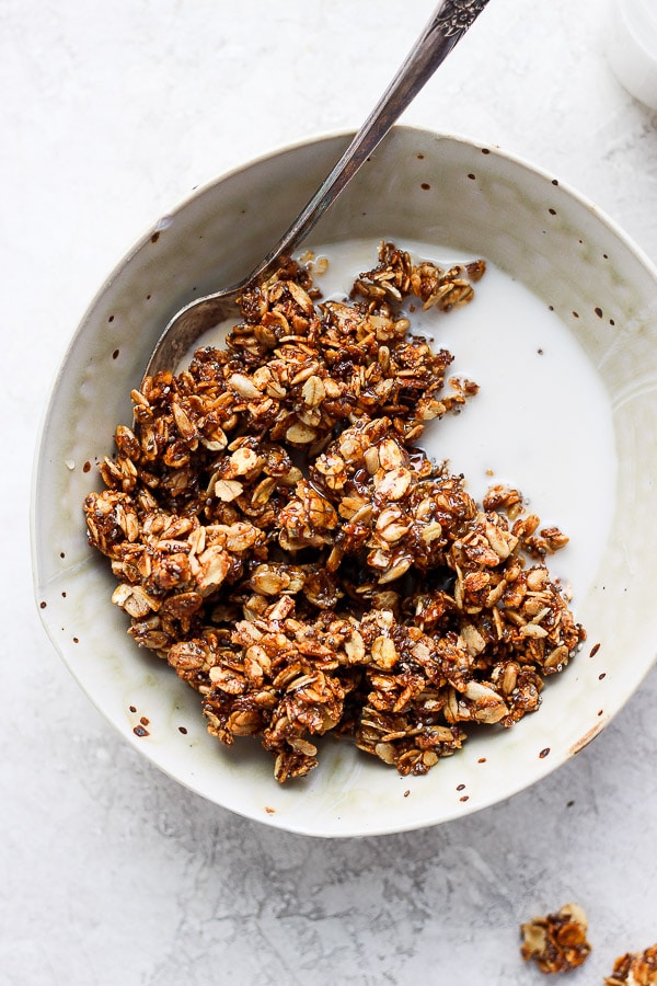 Healthy Homemade Granola - comfort food at its finest, yet packs powerful nutritional value.  The perfect way start your day or an afternoon (midnight) snack. (DF + Gluten-Free Friendly) #homemadegranola #healthyhomemadegranola #howtomakegranola #granolarecipes