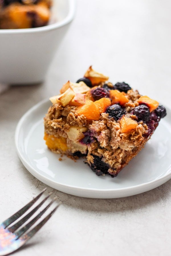 A piece of the healthy baked oatmeal on a white plate.