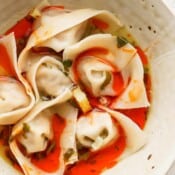 Bowl of spicy pork wontons.