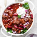 Bowl of short rib chili with horseradish sour cream.