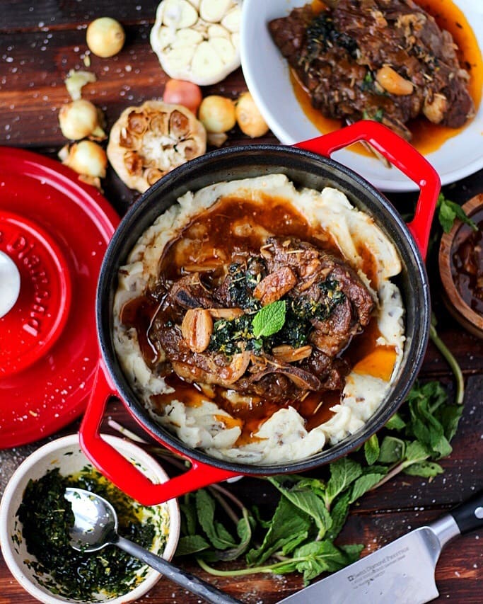 Braised Lamb Shoulder + Mint Gremolata and Roasted Garlic Mashed Potatotes - the perfect holiday meal! thewodenskillet.com 