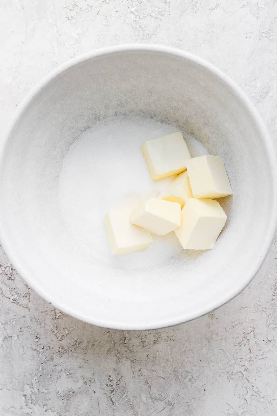 Butter and sugar in bowl.