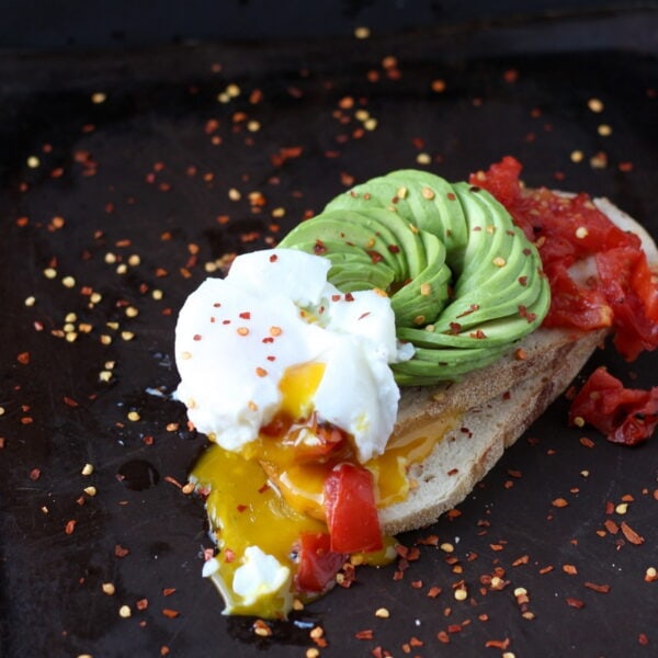 Spicy Avocado Toast + Roasted Tomatoes and Poached Egg - thewoodenskillet.com