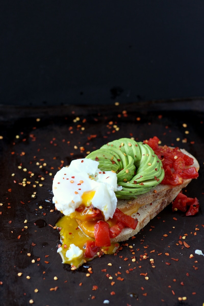 Spicy Avocado Toast + Roasted Tomatoes and Poached Egg - thewoodenskillet.com