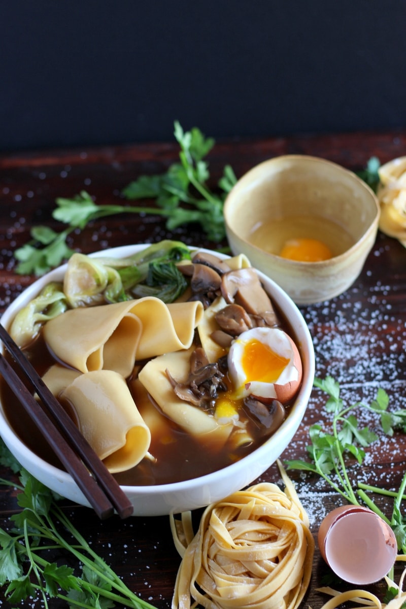 Thick Cut Homemade Noodles with bone broth, braised baby bok choy, mushrooms and soft-boiled egg. thewoodenskillet.com