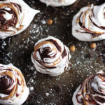 Peanut Butter and Chocolate Meringues - light and fluffy meringues, with pillow-soft insides, and swirled peanut butter and chocolate. thewoodenskillet.com