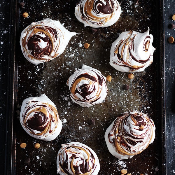 Peanut Butter and Chocolate Meringues - light and fluffy meringues, with pillow-soft insides, and swirled peanut butter and chocolate. thewoodenskillet.com #foodphotography