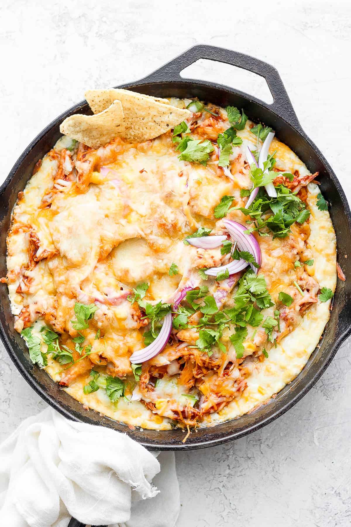 BBQ Chicken Dip in a cast iron skillet. 
