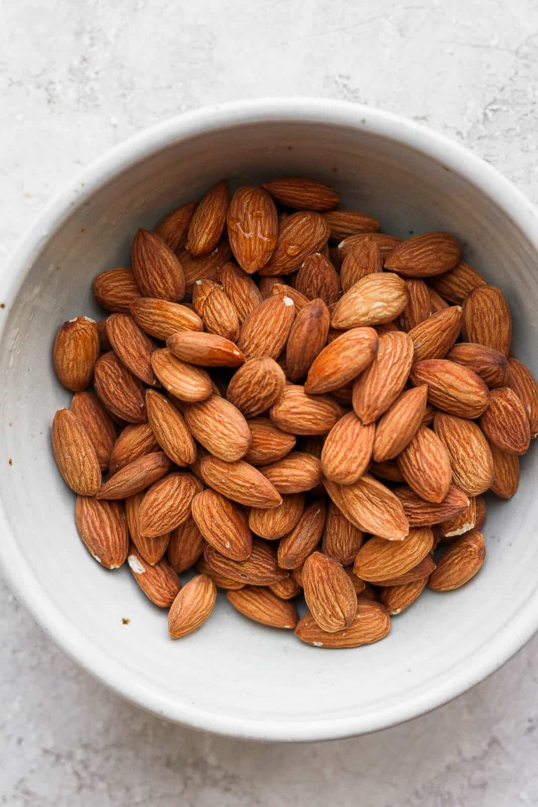 Raw almonds in a bowl. 