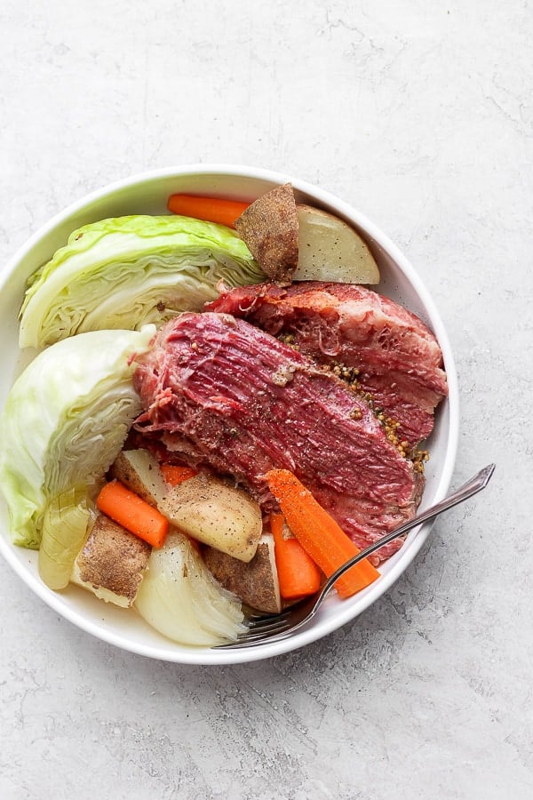 Bowl filled with corned beef and cabbage. 