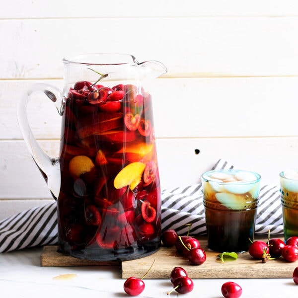 Infused Black Tea + Sweet Honey Whiskey - the perfect summer cocktail! thewoodenskillet.com