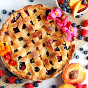 Peach, Raspberry and Blueberry Summer Pie - easy, delicious and a great way to use your summer fruit! - thewoodenskillet.com