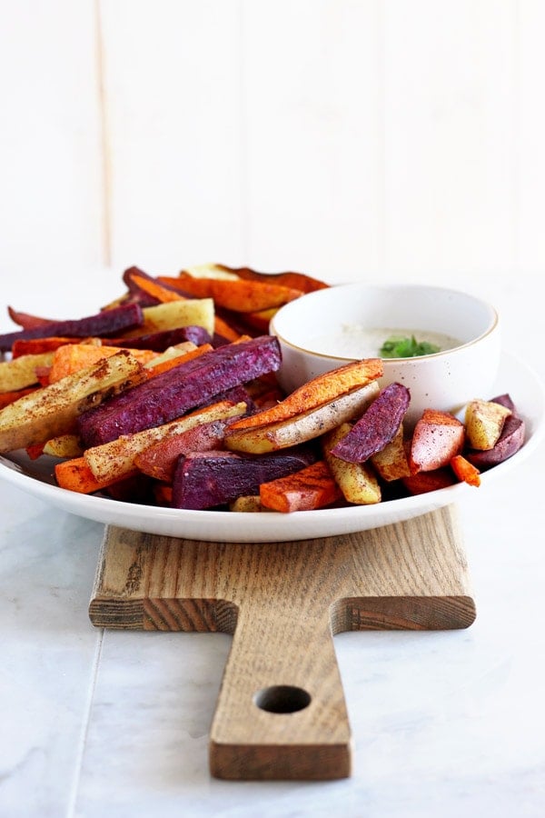 Sweet potato sticks on a large white plate.