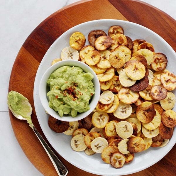 How to Make Homemade Plantain Chips - served with guacamole, these are the perfect healthy, holiday appetizer! #whole30 thewoodenskillet.com