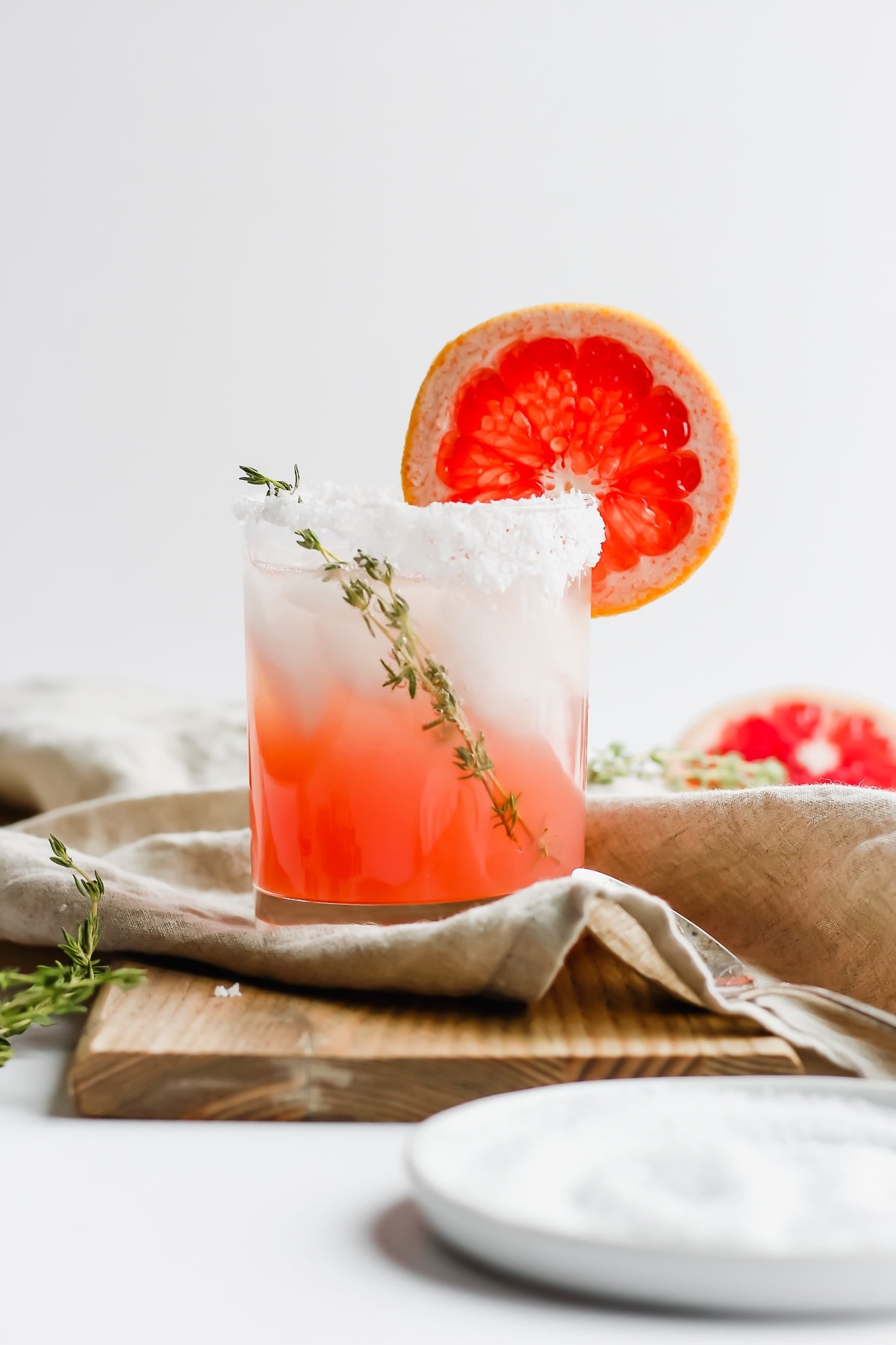 Citrus Paloma Mocktail with Thyme in a glass.  
