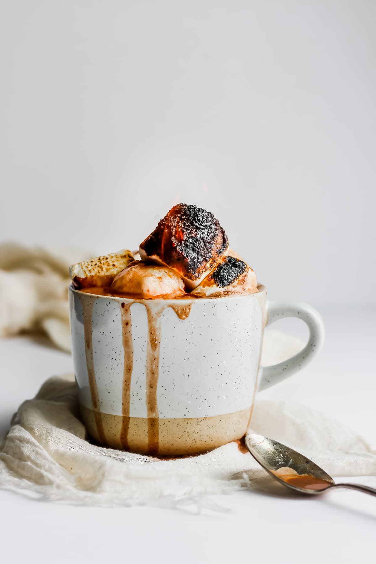 Mug of dairy-free hot chocolate with marshmallows on top.