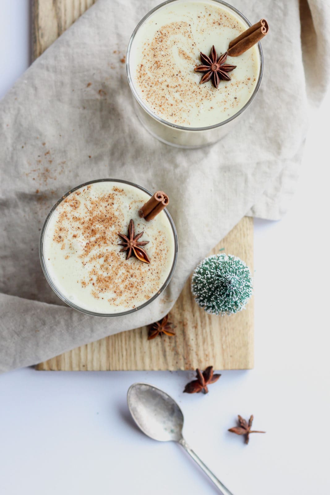 Top shot of two glasses of dairy free egg nog. 