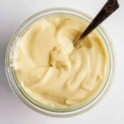 A weck jar full of whole30 mayo with a spoon sticking out of it.