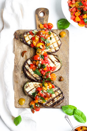 Delicious Grilled Eggplant Bruschetta - a healthy and delicious appetizer or small plate! Perfect for summer! #whole30 #paleo #vegan