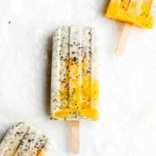 Three mango banana chia pudding pops.