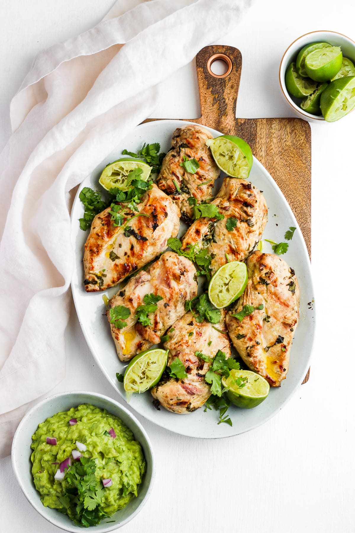 Platter of grilled cilantro lime chicken breasts. 