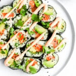 Spicy Salmon and Avocado Cauliflower Rice Sushi Roll - a whole30, paleo and gluten free way to eat sushi! #whole30 #paleo