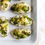 Cheesy Broccoli Twice Baked Potatoes - a delicious side dish for any meal that is Whole30, Paleo and Vegan!! #whole30 #vegan #broccolicheese #paleo #dairyfree