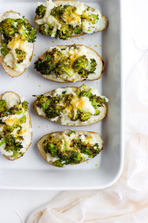Cheesy Broccoli Twice Baked Potatoes - a delicious side dish for any meal that is Whole30, Paleo and Vegan!! #whole30 #vegan #broccolicheese #paleo #dairyfree