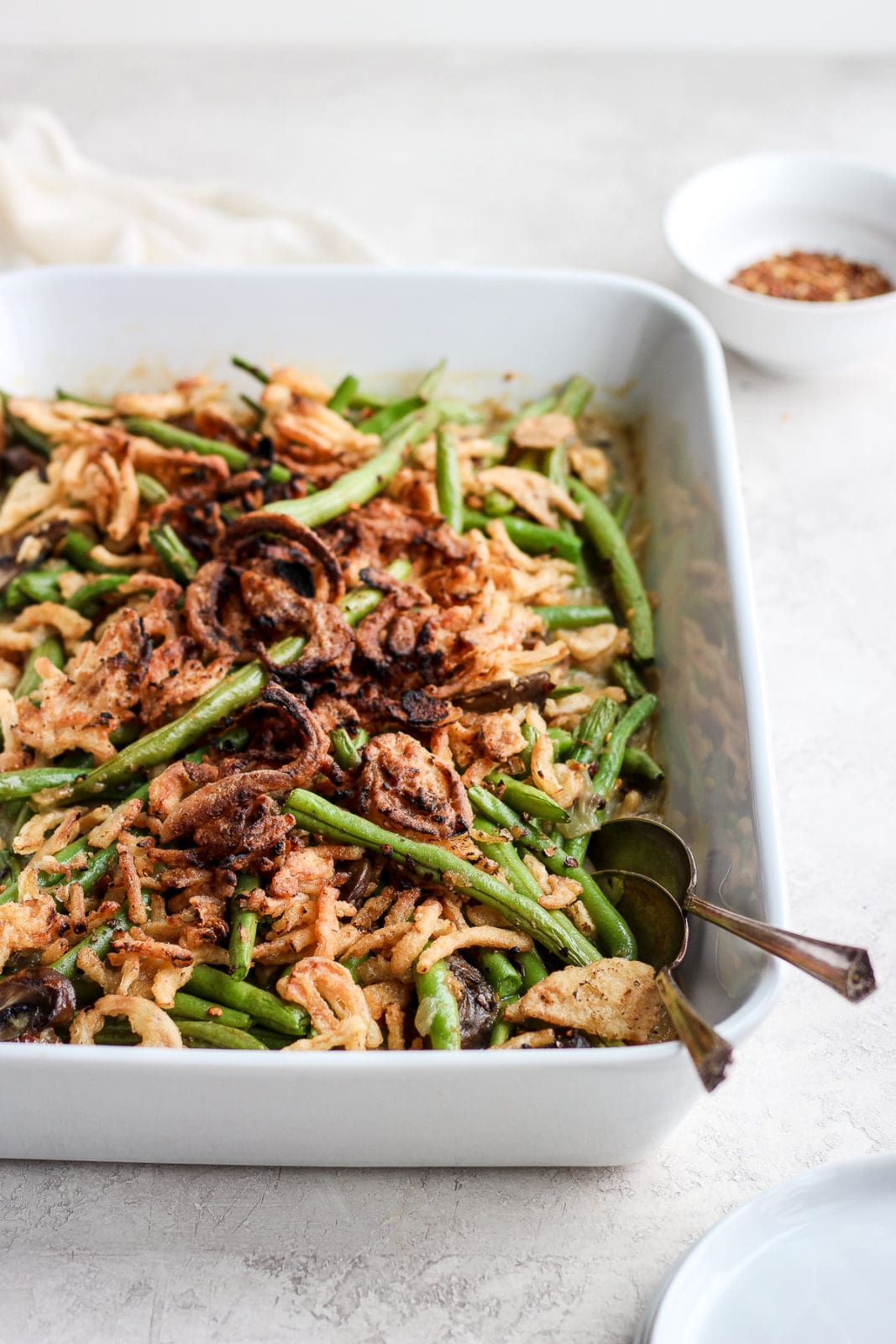 Dairy-Free Green Bean Casserole - the classic holiday side dish made with dairy-free cream of mushroom soup! So delicious! #thanksgiving #christmas #greenbeancasserole #dairyfree