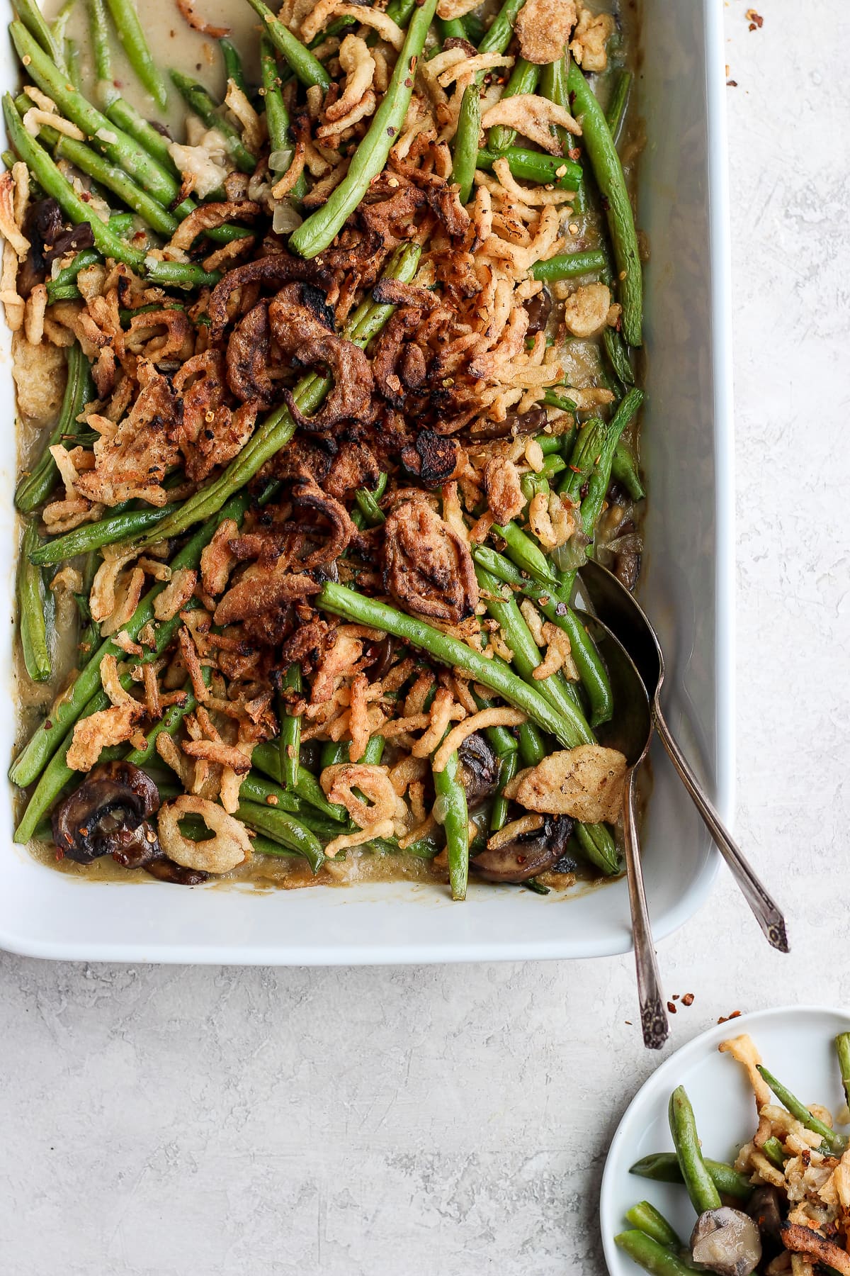 A close up of a cooked dairy free green bean casserole.