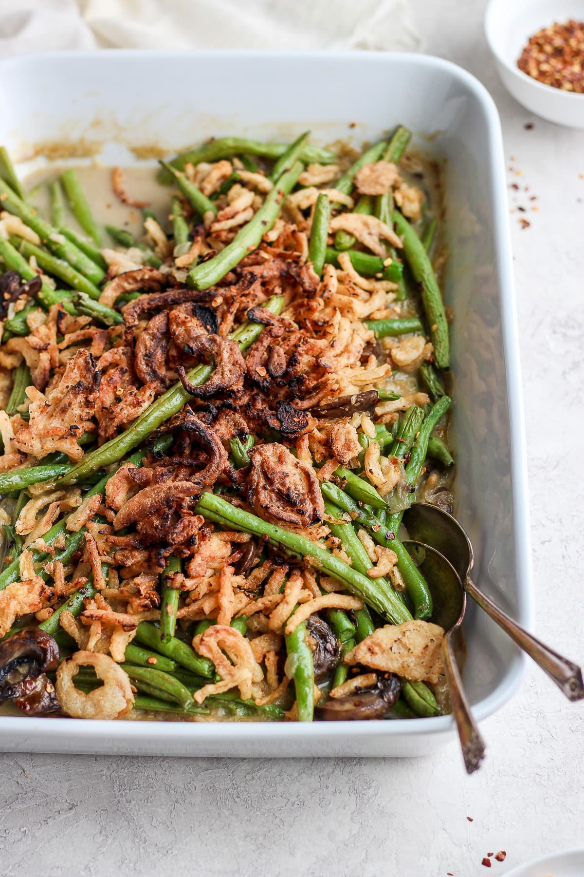 A close up of a cooked dairy free green bean casserole.