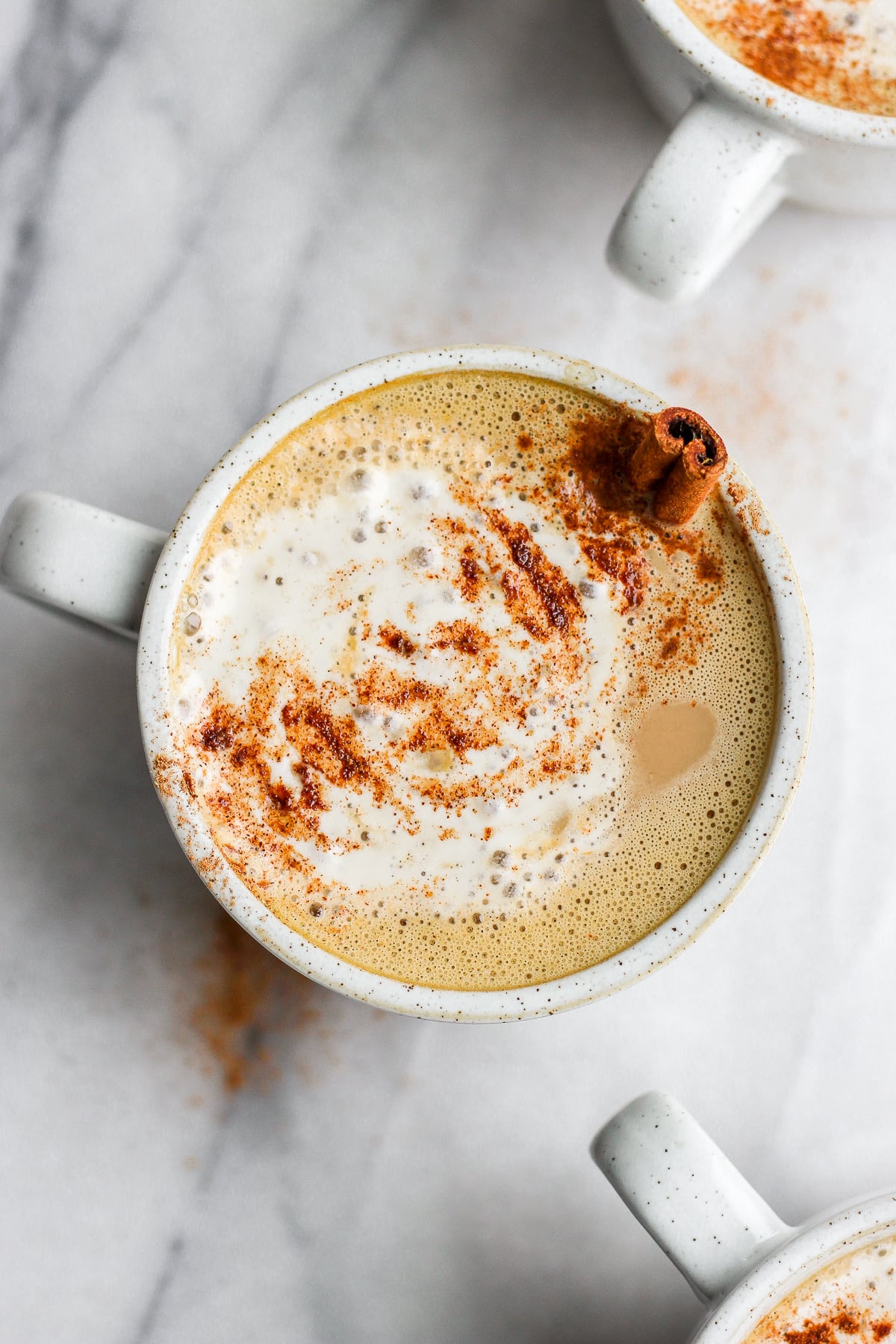 Top shot of a pumpkin spice latte in a mug.