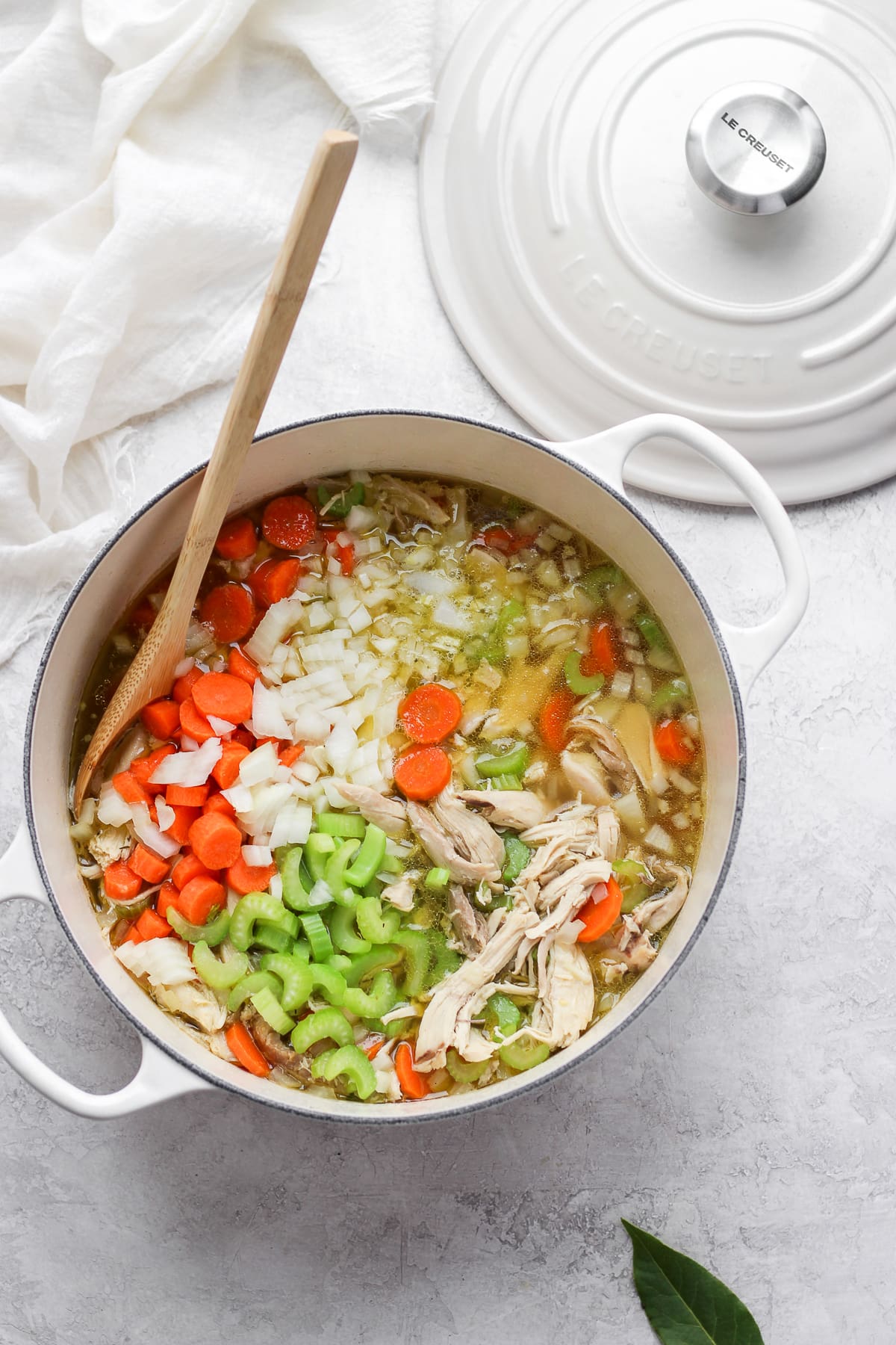 A Dutch Oven filled with Homemade Chicken Soup.