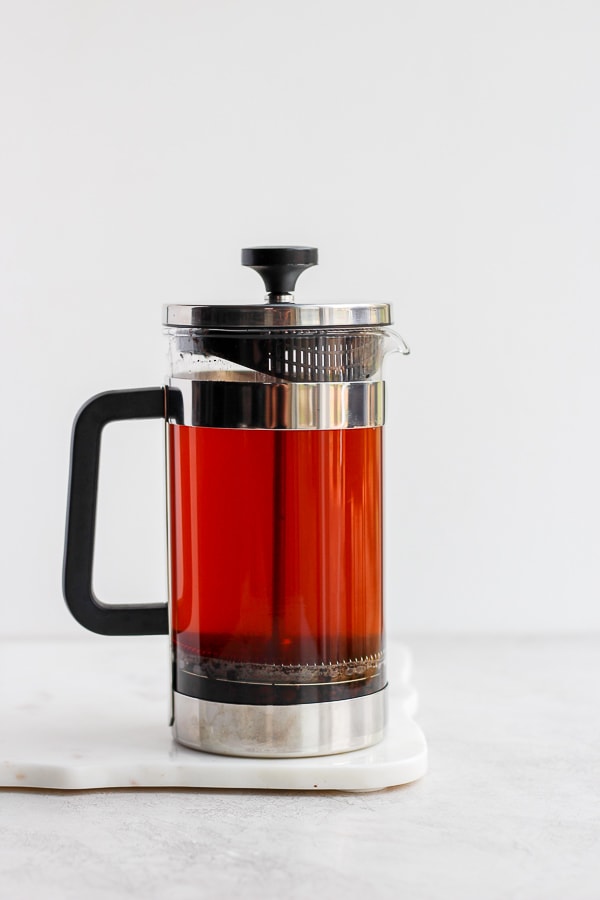 A French press filled with cold brew coffee. 