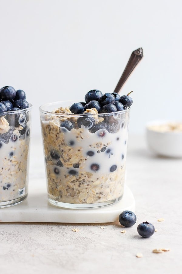 Two glasses of blueberry overnight oats. 