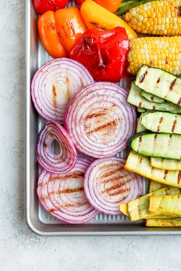 Grilled onions with a variety of other grilled vegetables.