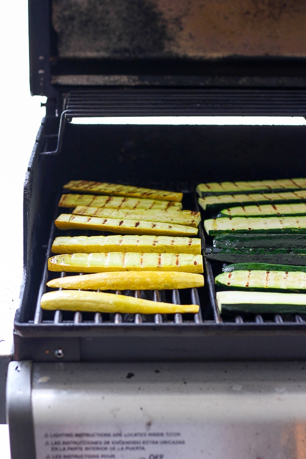 Yellow squash slabs on the grill.