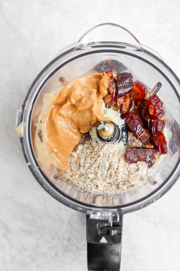 All of the cookie dough bite ingredients in a food processor.