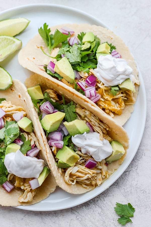 Salsa verde chicken in tacos with avocado. 