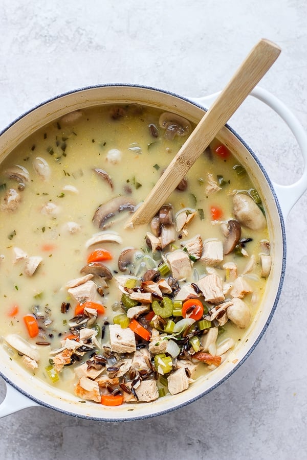 Turkey wild rice soup recipe in a dutch oven.