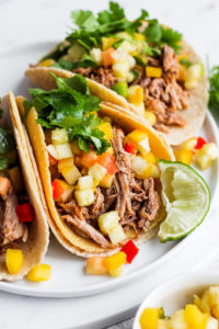 Easy Pulled Pork Tacos + Mango Pineapple Salsa - The Wooden Skillet