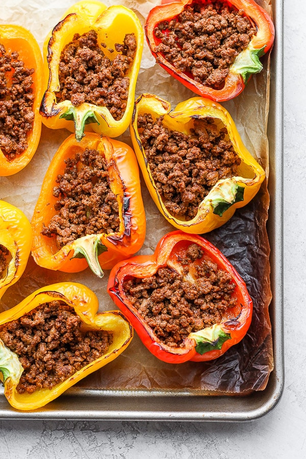 Cooked bell peppers filled with taco meat. 