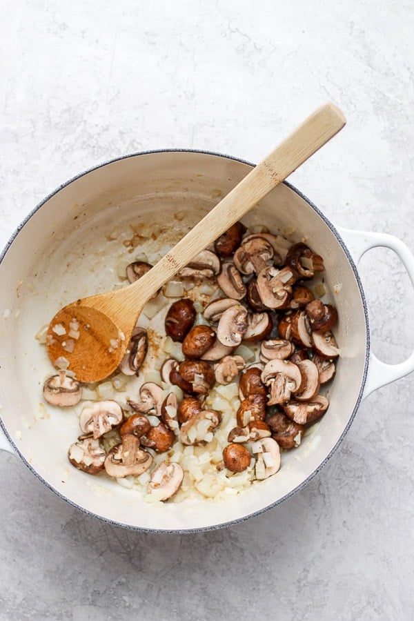 Mushrooms added to the pot.