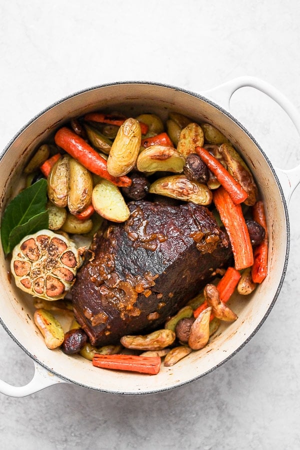 Dutch Oven Pot Roast - the ultimate comfort food!!  Simple, yet sophisticated flavors your whole family will love! (Whole30/Paleo/GF/DF) #bestpotroast #dutchovenpotroast #classicpotroast #potroast #whole30dinner #whole30recipes 