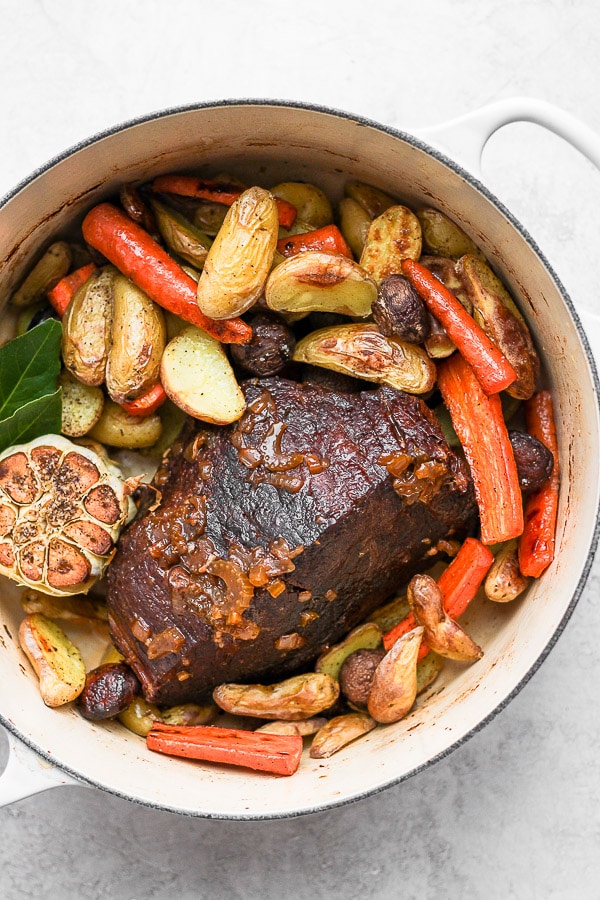 Dutch Oven Pot Roast - the ultimate comfort food!!  Simple, yet sophisticated flavors your whole family will love! (Whole30/Paleo/GF/DF) #bestpotroast #dutchovenpotroast #classicpotroast #potroast #whole30dinner #whole30recipes 