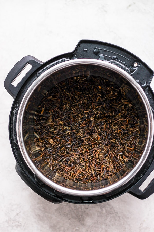 Fully cooked instant pot wild rice in an instant pot.